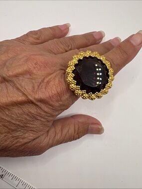 Coach Gold-Tone Statement Ring with a purple Gemstone